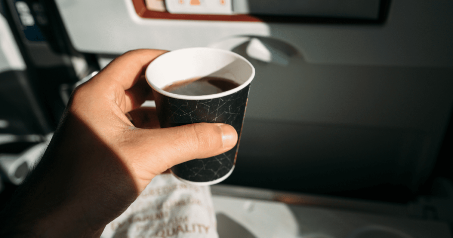 In flight services offered in a plane a cup of coffee british airways premium economy